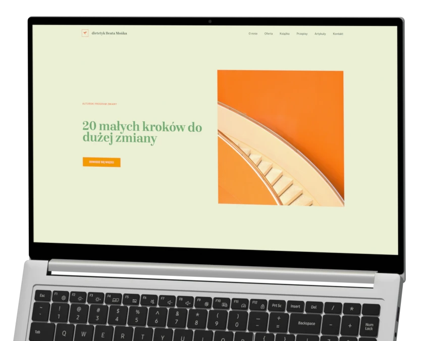 A realistic render of an open laptop displaying the Przepisy na zdrowie website